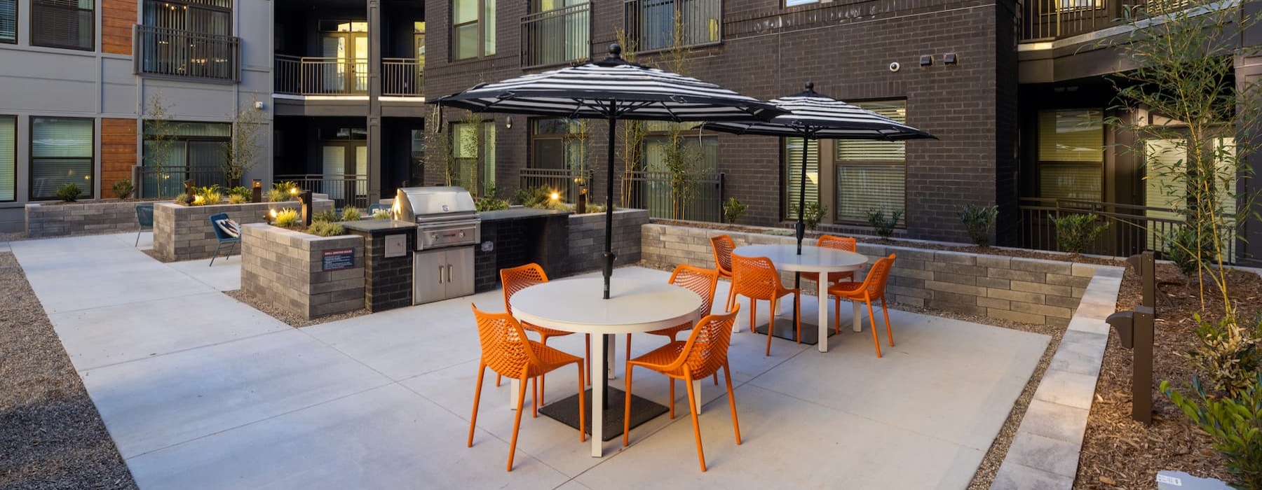 outdoor dining area with big umbrellas and much seating