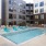 pool with reclining seats and modern stonework