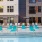 pool with reclining seats and modern stonework