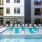 pool with reclining seats and modern stonework