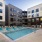pool with reclining seats and modern stonework