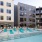 pool with reclining seats and modern stonework