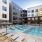 pool with reclining seats and modern stonework