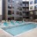 pool with reclining seats and modern stonework