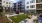 outside courtyard with corn hole and seating