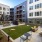 outside courtyard with corn hole and seating
