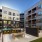 outside courtyard with ample seating and closeness to other amenities