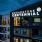 exterior of Broadstone Centennial showing well-lit lounge room